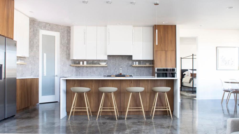 Modern kitchen with ready to assemble cabinets in white and walnut euro-style frameless design