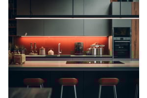 Modern frameless RTA kitchen cabinets in sage green with flat slab doors and orange backsplash