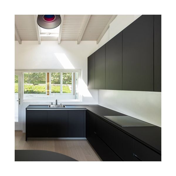 Modern kitchen with Acrylic Matte Black cabinet doors and black appliances