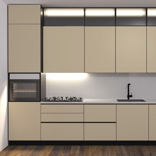 Modern kitchen featuring beige satin cabinet doors and light-filled interior