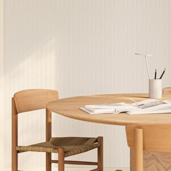 Yute herringbone wall paneling in a dining room, lacquered in soft white Soft Touch