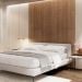 Prisma diamond wall paneling behind a bed, lacquered in ivory Soft Touch